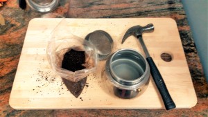 stovetop espresso being made with hand ground coffee beans